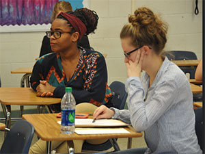Chelsey Fix and Azaria brown judging a high school competition