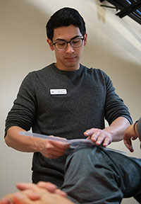 DPT student working in the clinic