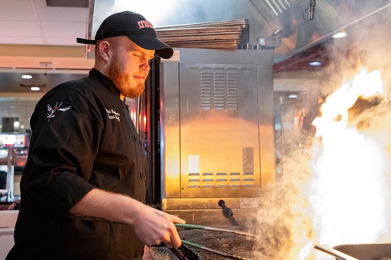 John Barker, sous chef, in the kitchen at Burton Dining Hall.