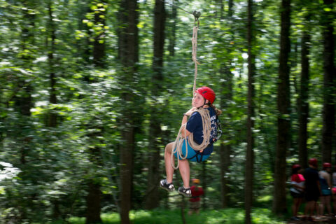 Woman on a zip line.