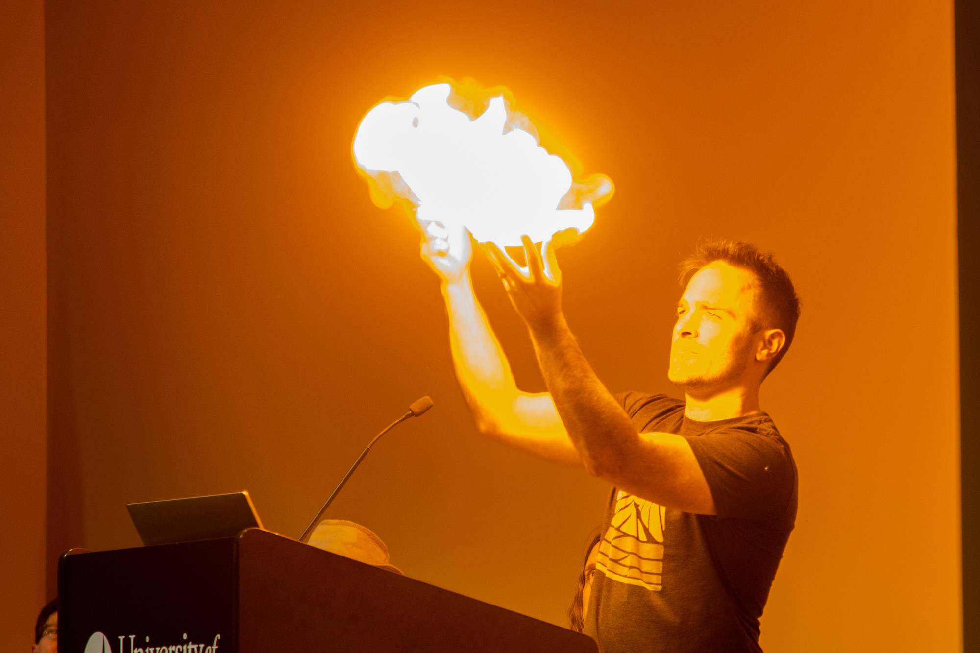 A professor making a fireball.