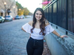 Ariel Lineberry poses on Commerce Street