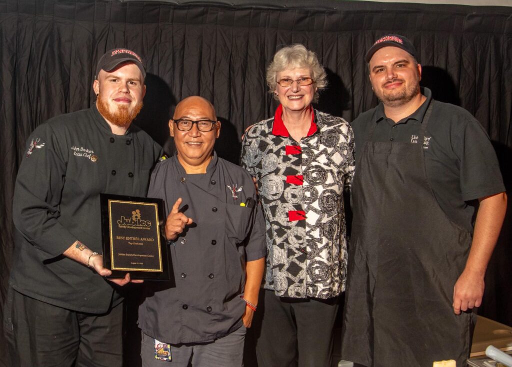 Pictured (left to right) are Sous Chef John Barker and Cook Lead Dante Rosales, President Dr. Alison Morrison-Shetlar, and Dining Hall Manager