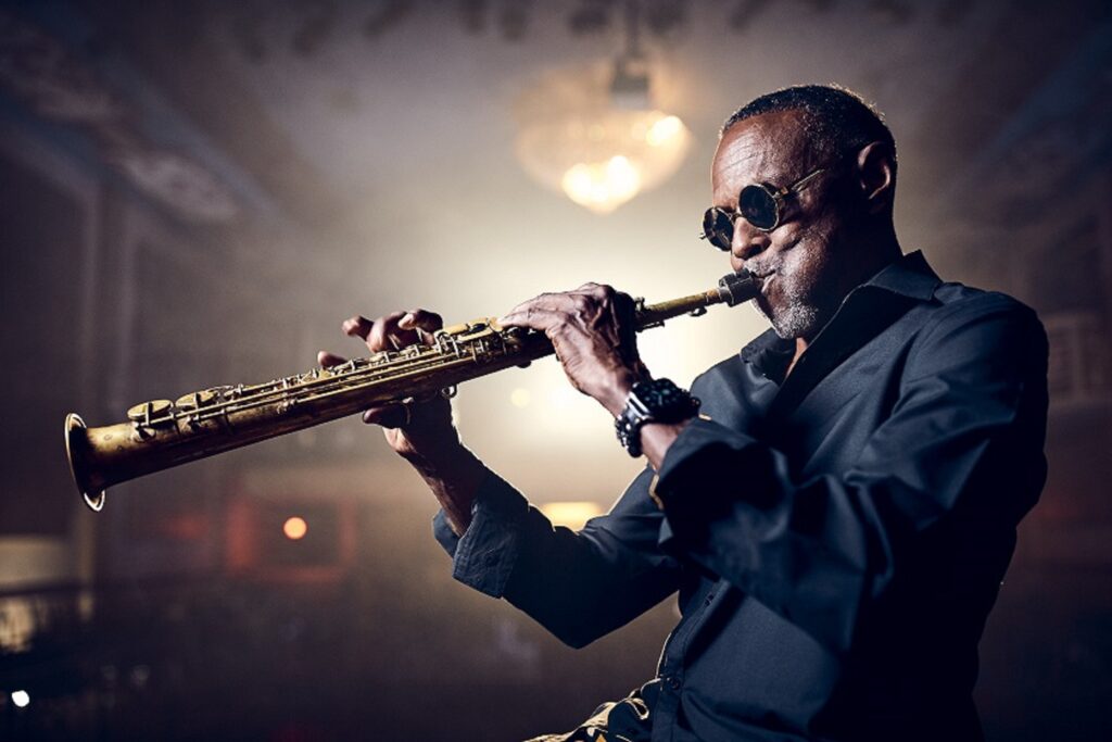 J. Plunky Branch plays saxaphone