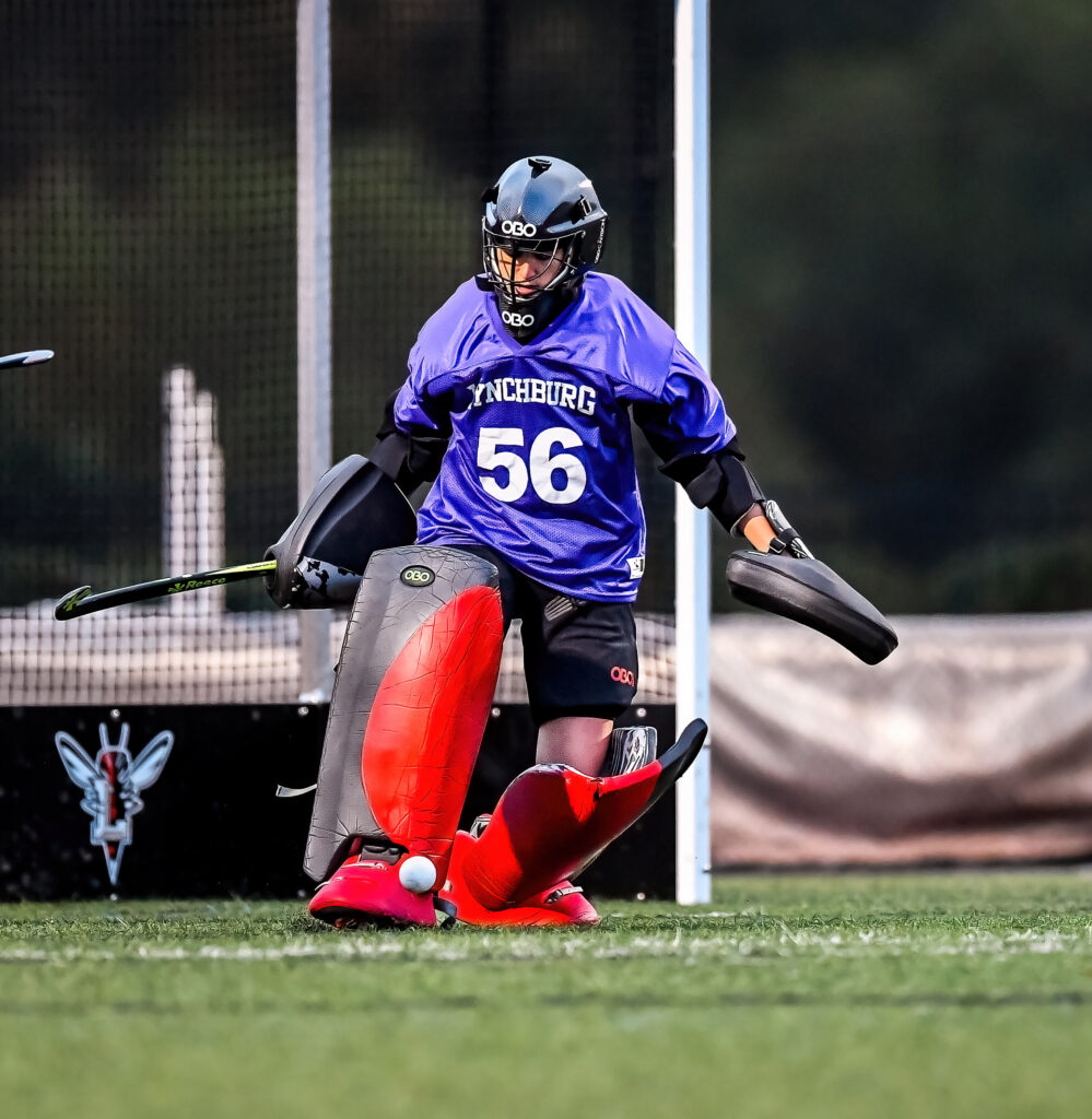 Samira Gharavi-Nouri ’26 stops a shot for Lynchburg’s field hockey team. 