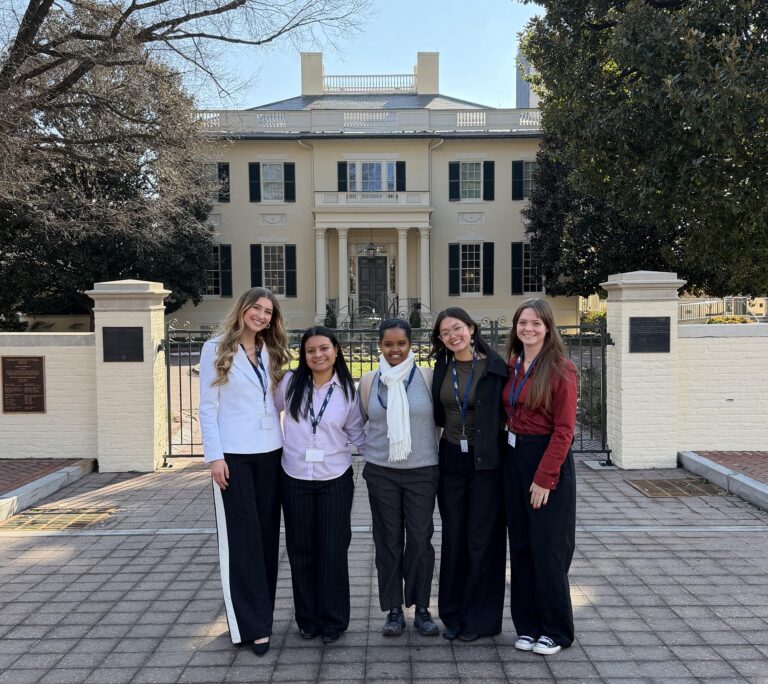 Pictured in front of the Executive Mansion in Richmond (left to right) are Susanna Shedd ’27, Jenny Moran Serrano ’27, Feker Fetene of Emory & Henry University, Camila Condado ’28, and Ashby Watts ’28.