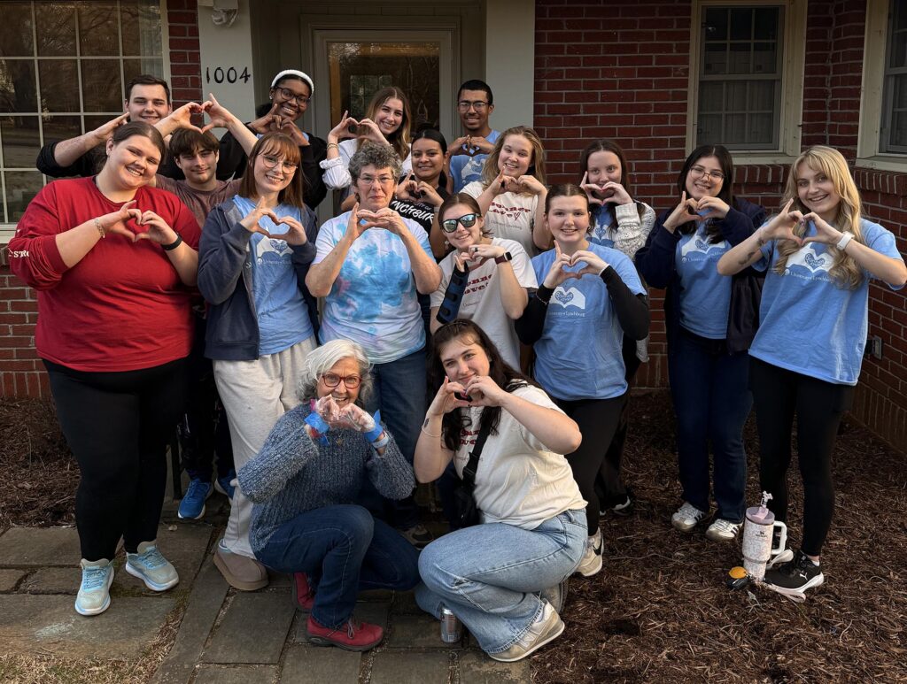 Bonner Leaders and church volunteers pose for a photo while doing service work at Trinity Lutheran Church in Lynchburg.