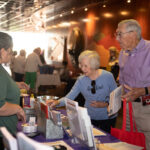 Senior citizens at an expo-type event