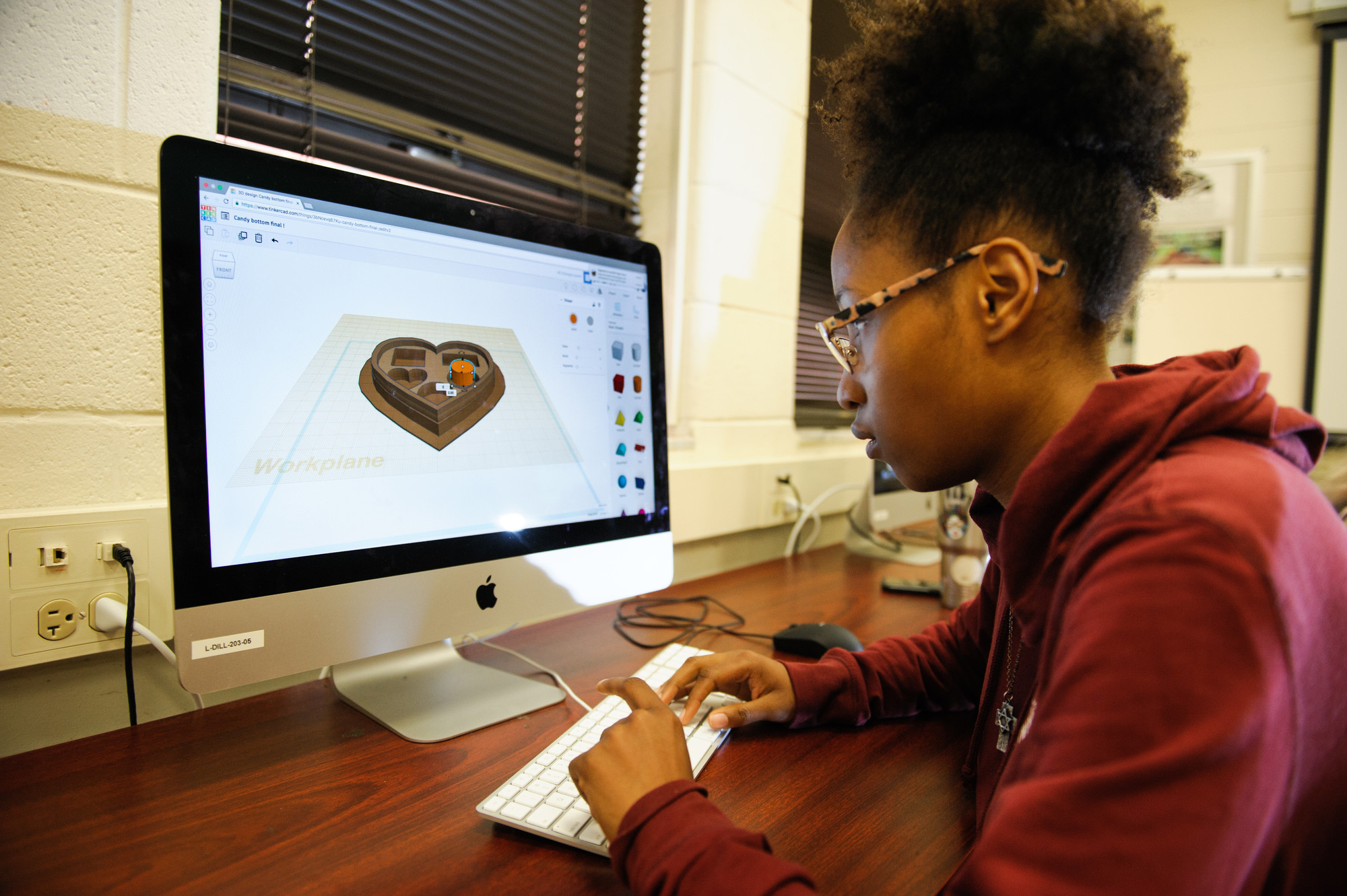 A Digital Fabrication Minor student working on a 3D model.