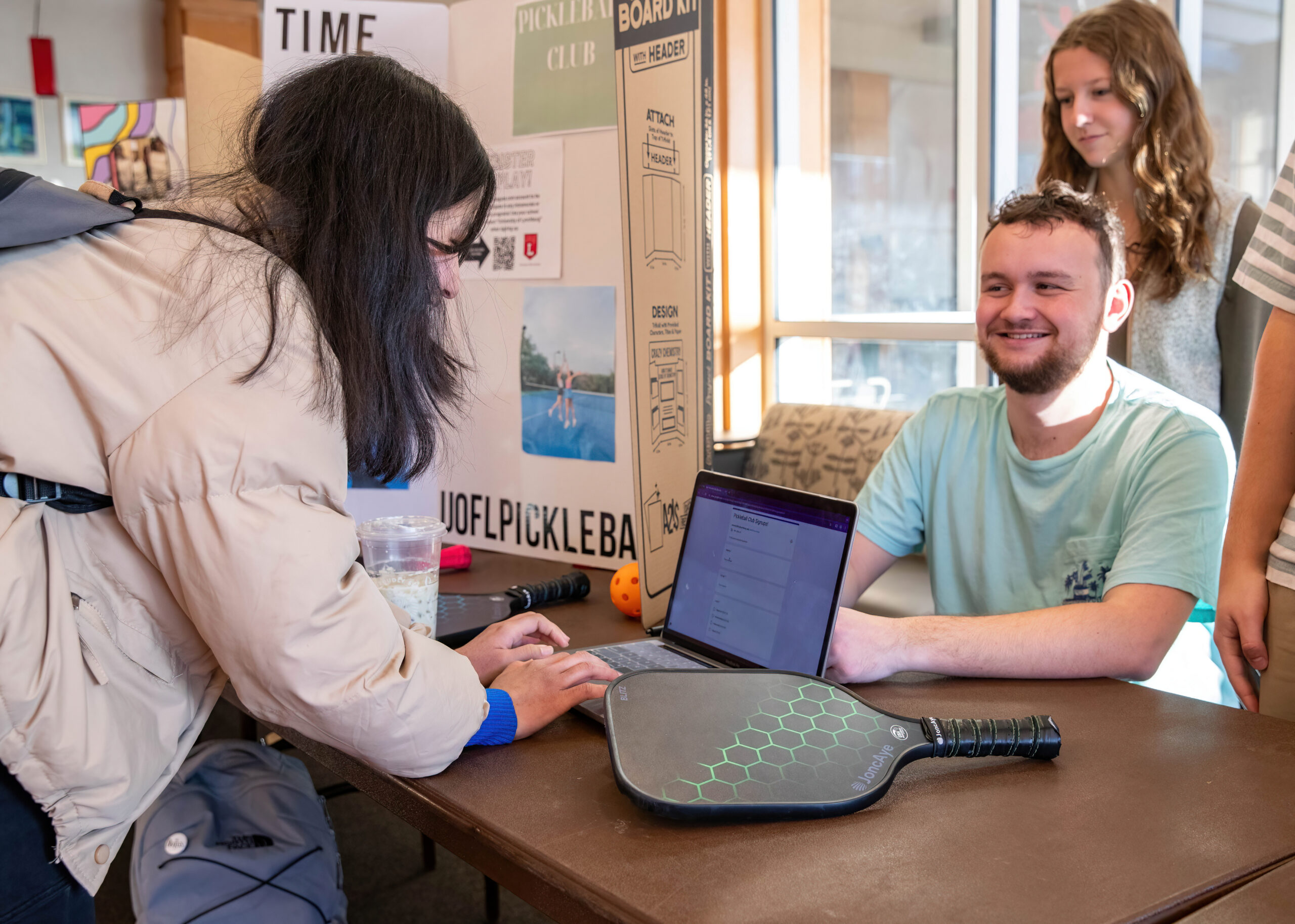 student signs up fro a club