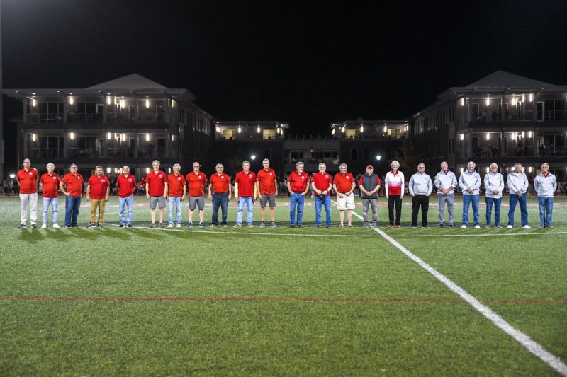 Soccer players from the classes of 1971 and 76 at Homecoming 2022