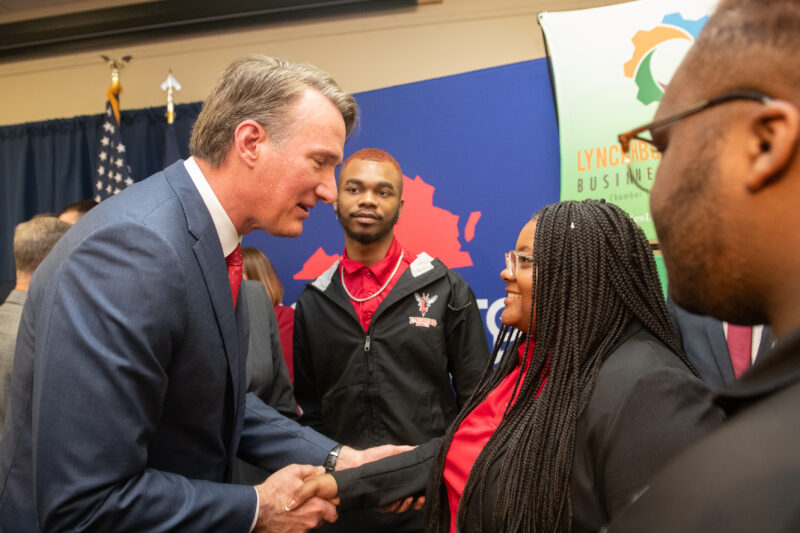 Alicia Lawrence ’25 talks with governor