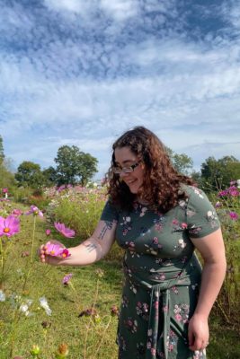 Victoria Hauck in a field of flowers