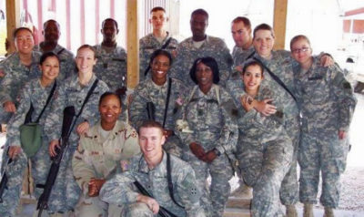 Sharon Denson DSMc with a group of fellow soldiers