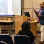 Dr. Jake Newsome speaks at a recent lecture.