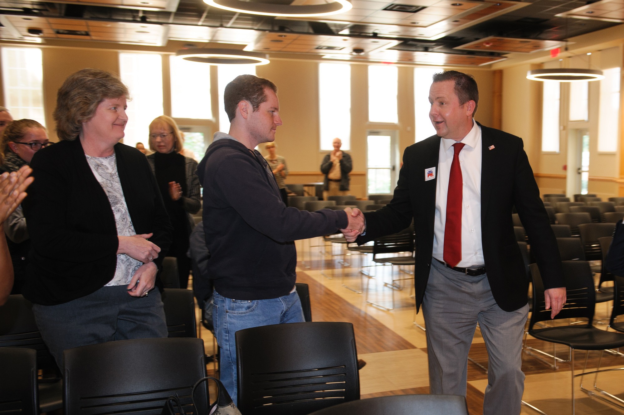Corey Stewart shaking hands at University of Lynchburg