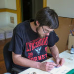 Eric Taylor working in archaeology lab