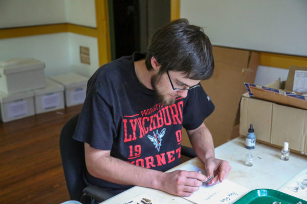 Eric Taylor working in archaeology lab