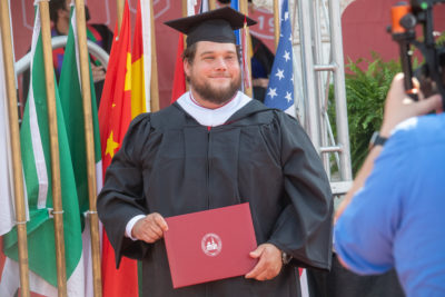 Tim Slusser pauses for a photo during Commencement 2022. 