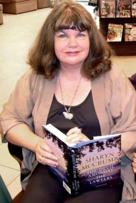 Sharyn McCrumb holding book