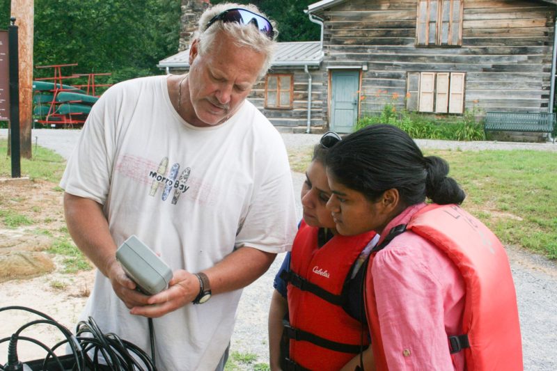 Dr. Tom Shahady works with students at Ivy Creek Park in Lynchburg in 2018.