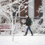 Student walking in snow