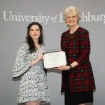 Winona Gear '23 accepts award from Dr. Alison Morrison-Shetlar