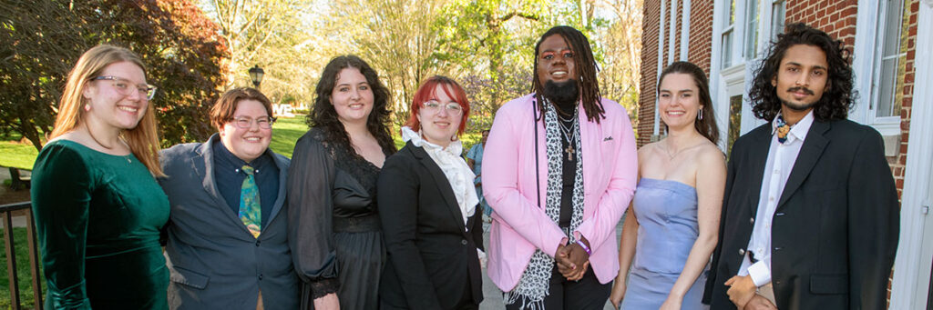 Members of the gender sexuality alliance pose for a photo