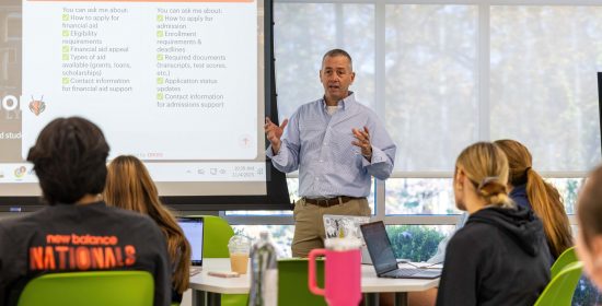 Charley Butcher leads a class on AI