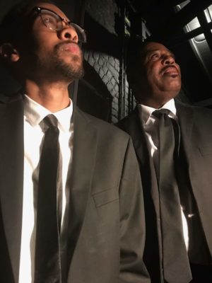 Desmond Mosby and James Stewart portraying Malcolm X and Martin Luther King Jr.