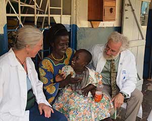 Gary Spinner working with patients in a clinic in Uganda