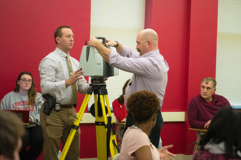 Two men demonstrate radar detection in a criminology class