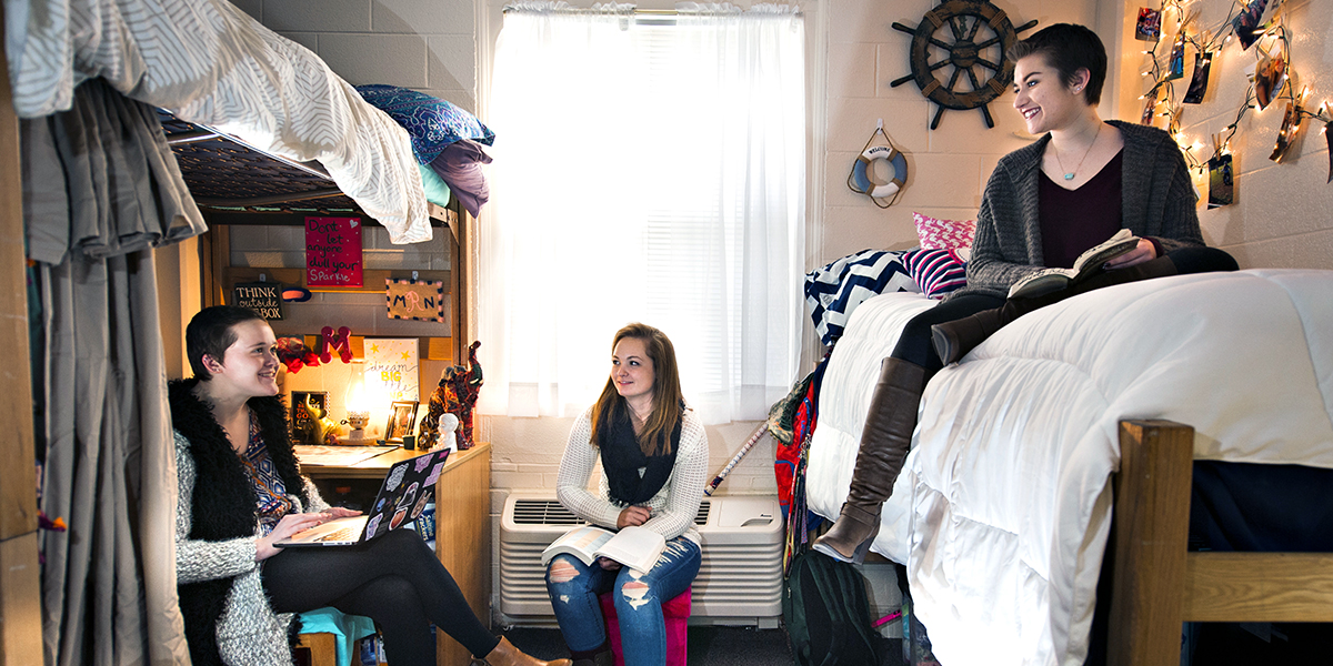 Students studying in their room in Montgomery Hall