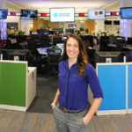 Emily Brown standing in the USA Today Network office