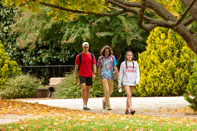 Three University of Lynchburg students walking outdoors