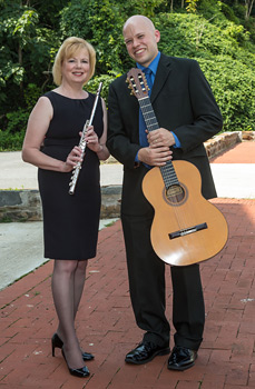 Alycia Hugo and Sean Beavers pose with their instruments