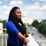 D'Andria Alston-Thomas overlooks Washington D.C. Capitol Building is seen in the background