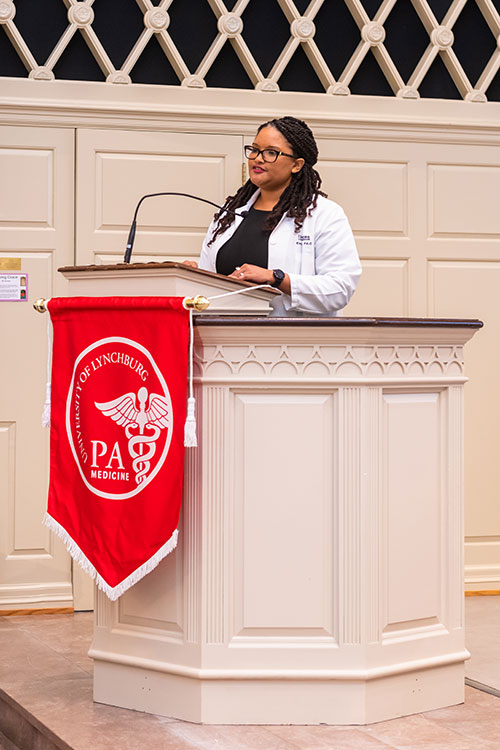 Dr. Kimberly Sapre at podium