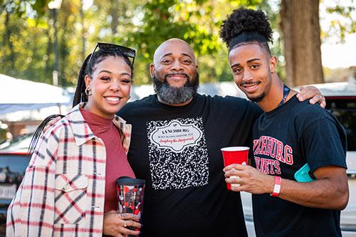 A family poses during Parents and Family Weekend